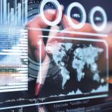 Selective focus of data analysts pointing on graphs on computer monitor. 
